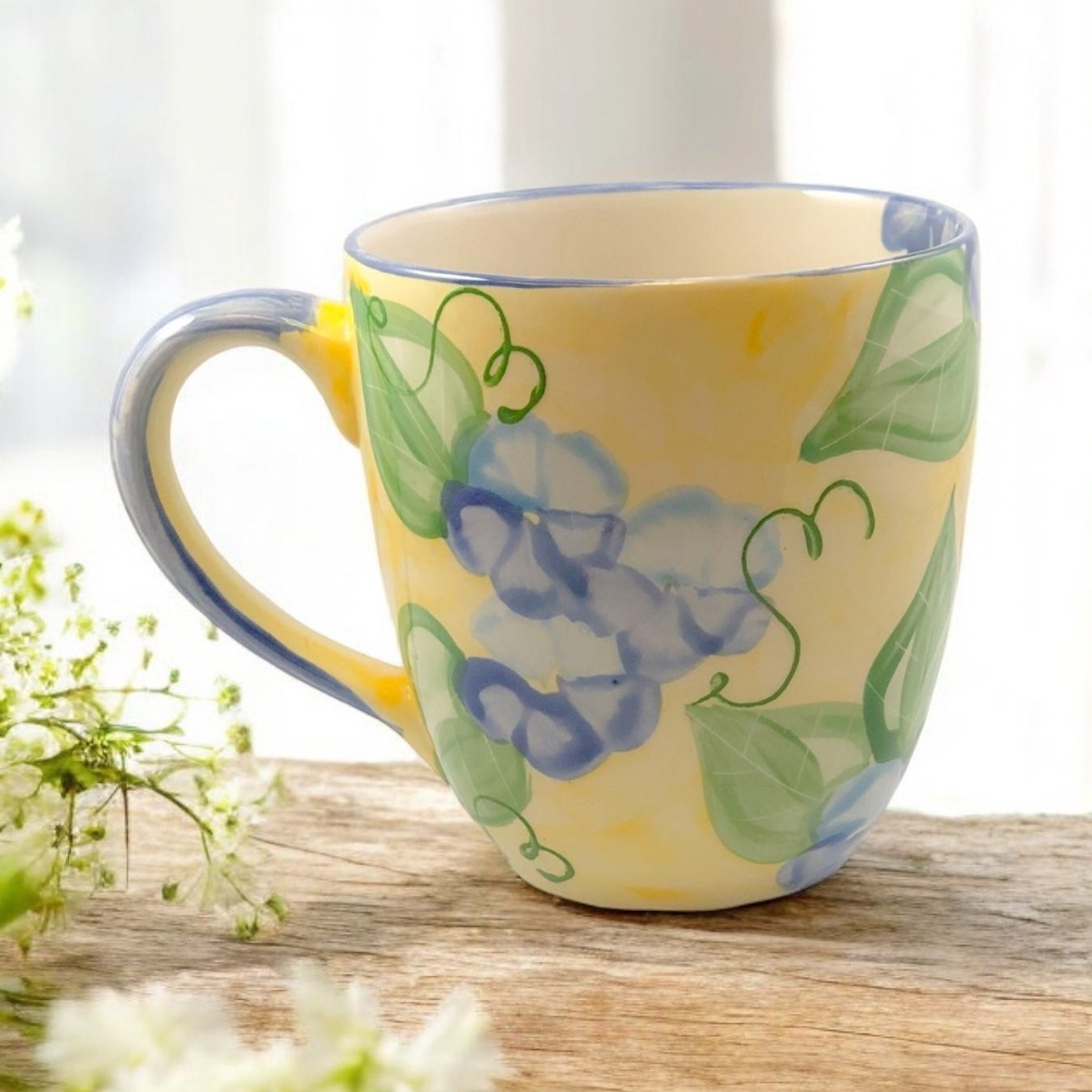 Yellow and blue floral mug by Ladybird Ceramics