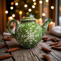 green snowflake painted ceramic teapot