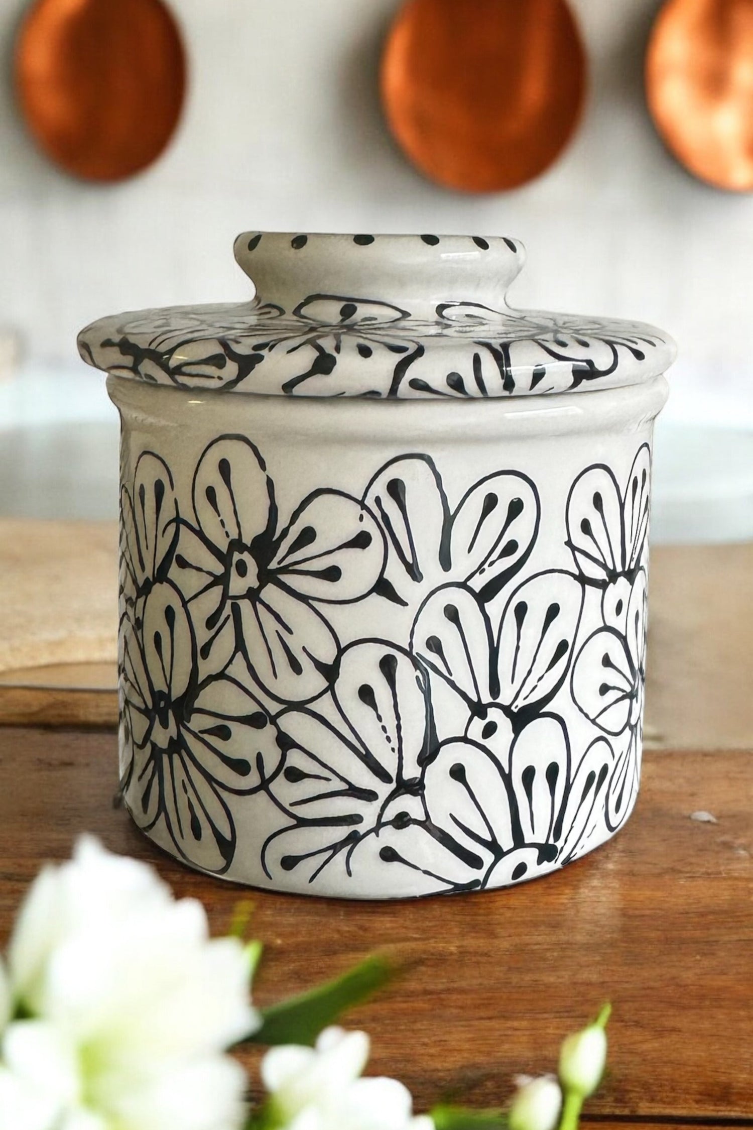 black floral painted butter crockery