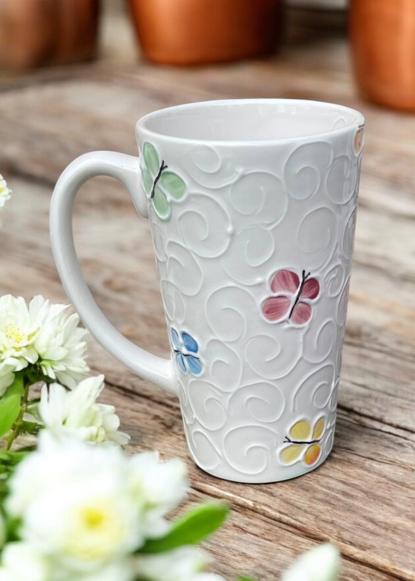 butterfly tall mug handpainted by Ladybird Ceramics Canada