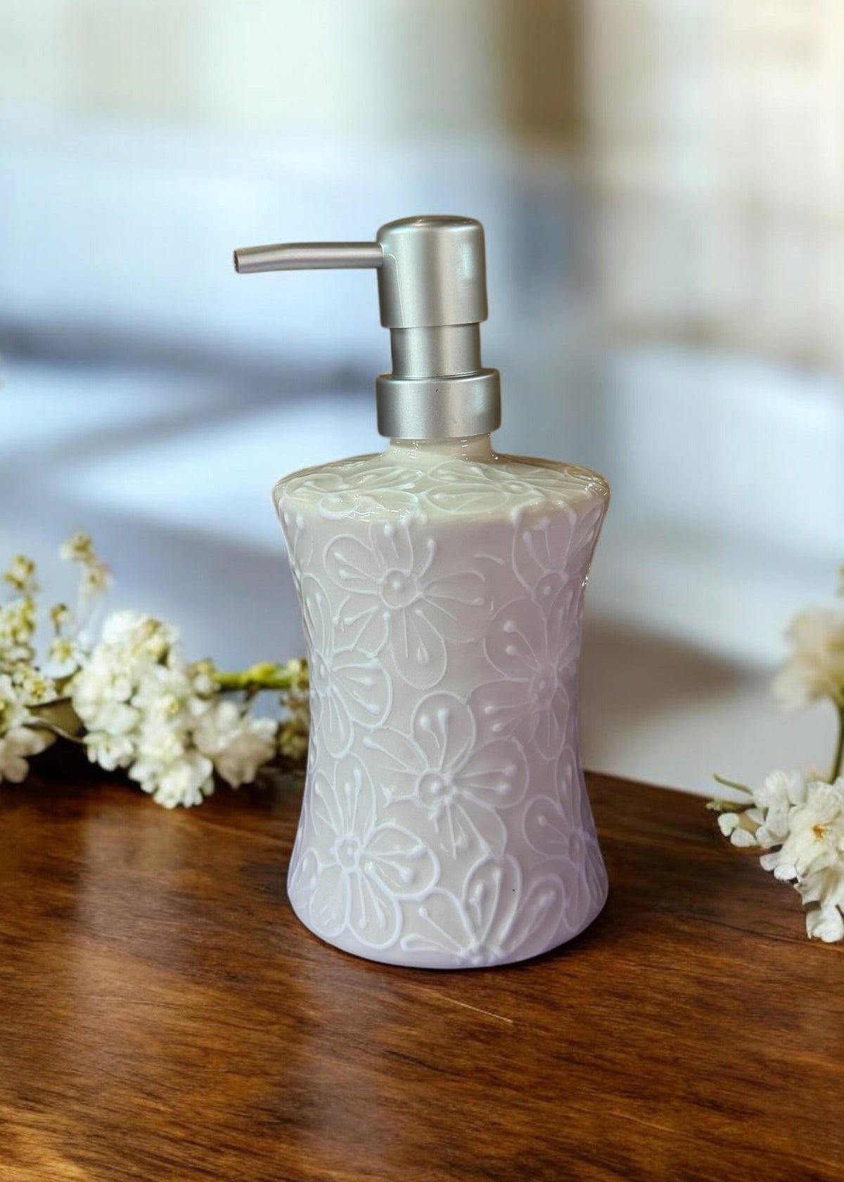 white ceramic hand soap dispenser 