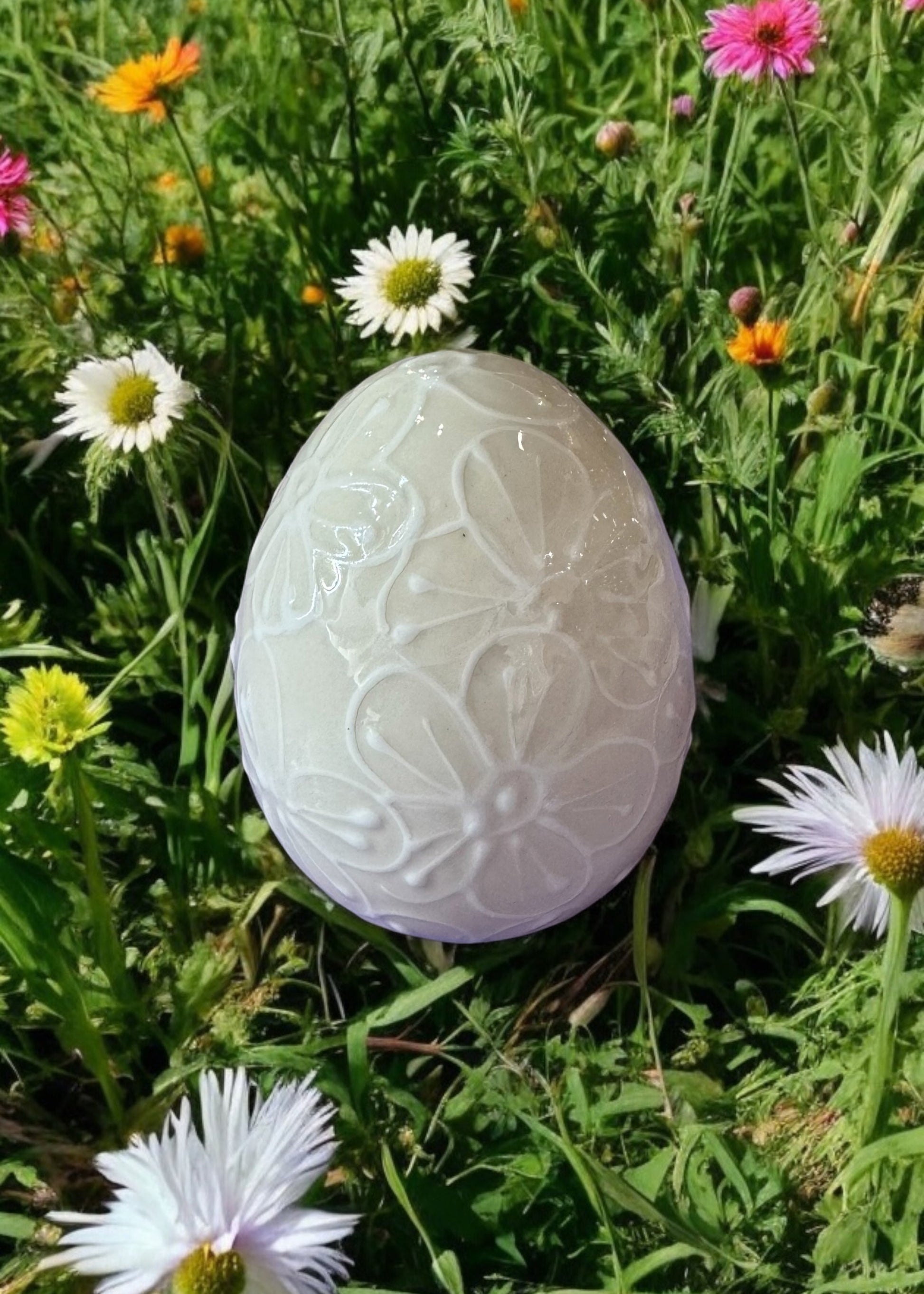 white floral ceramic easter egg